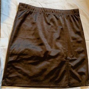 This a black mini skirt size small .